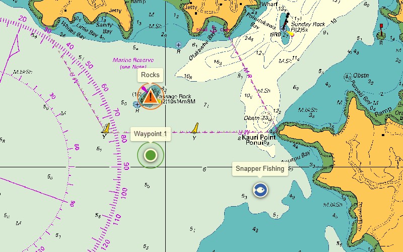 My Helm on a LINZ chart near Waiheke Island, showing a waypoint, a rocks hazard and a fishing spot